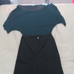 Blue pin striped slacks with green cotton blouse